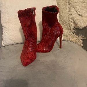 Red snakeskin booties